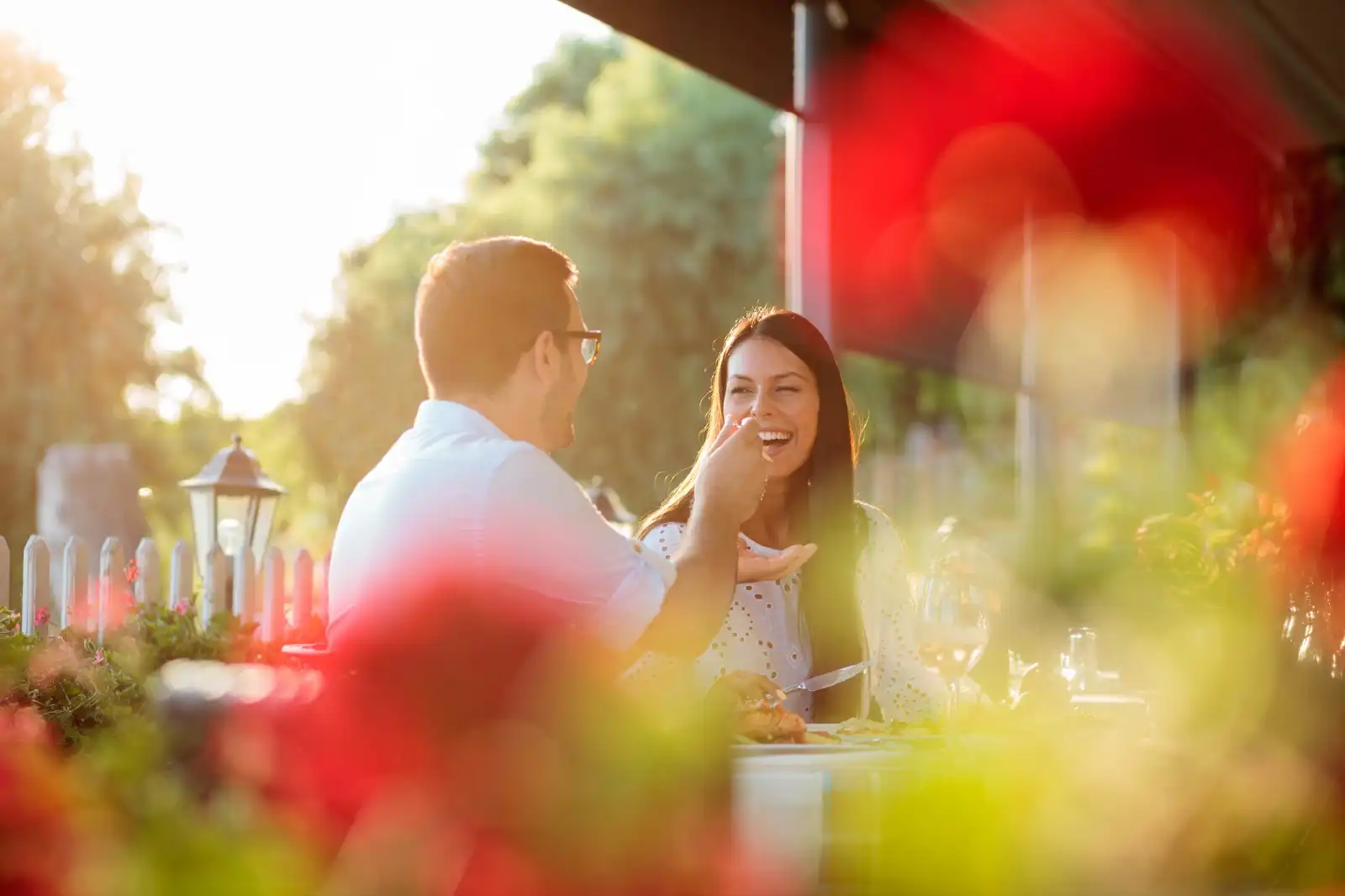 Couple enjoying a gourmet meal during a MONACAIR experience